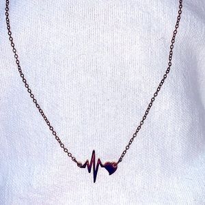 Heartbeat necklace stainless steel gold women jewelry worn 1 in great condition.
